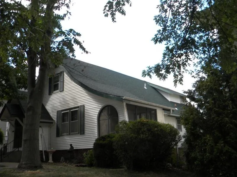 Slide of Holmes Roofing