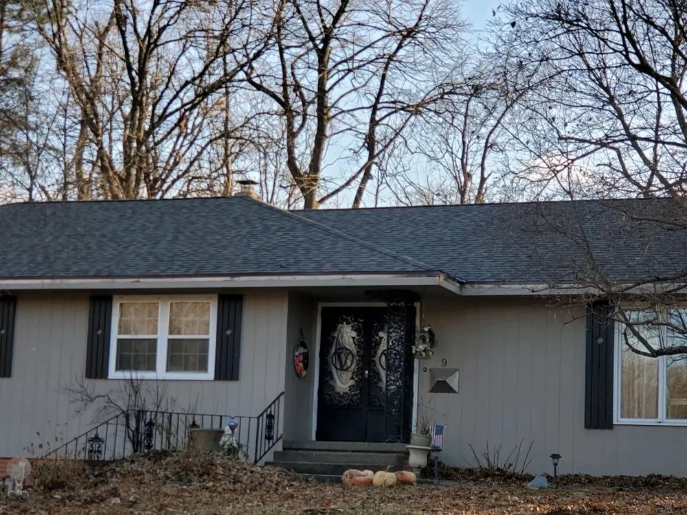 Slide of Holmes Roofing