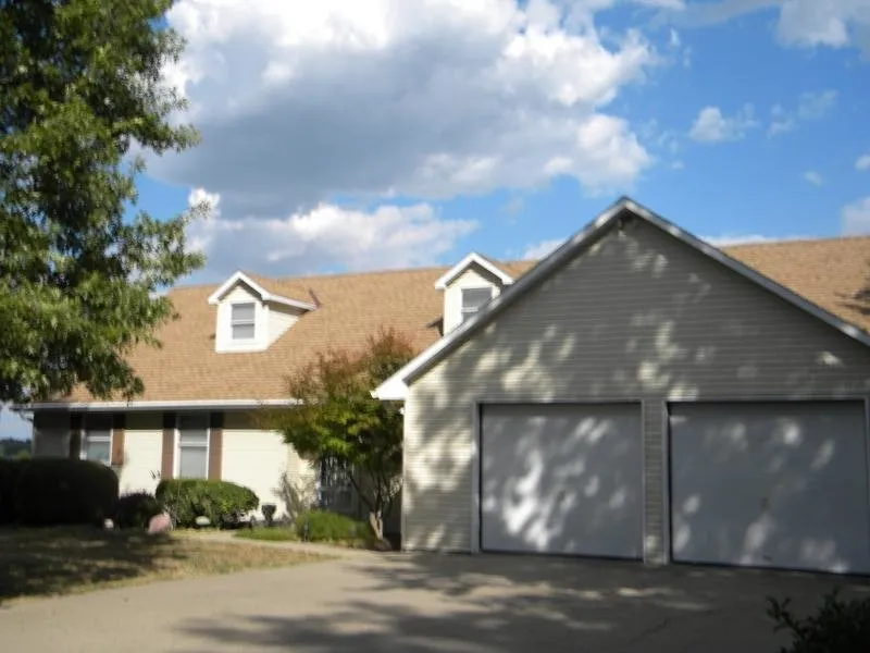 Slide of Holmes Roofing