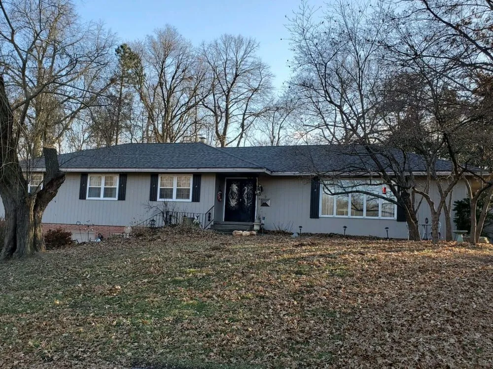 Slide of Holmes Roofing