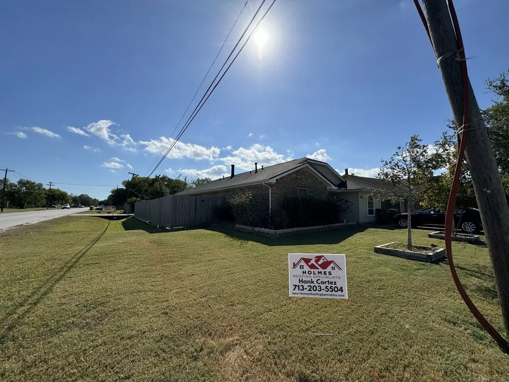 Slide of Holmes Roofing Specialists