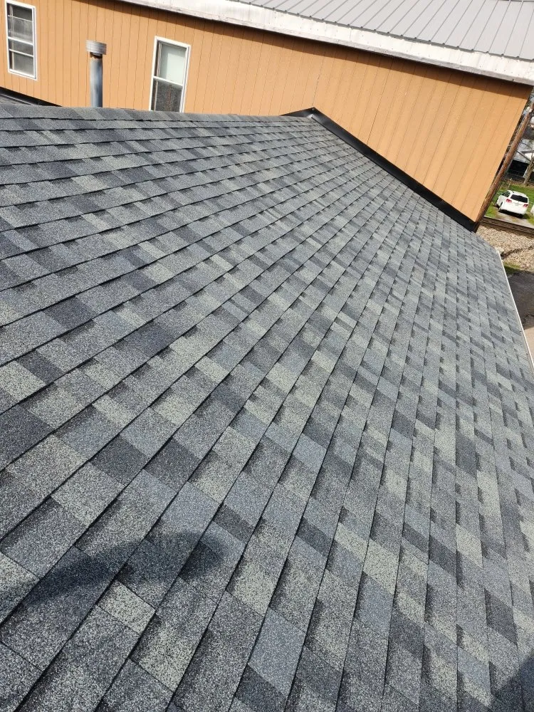 Slide of Holt Roofing