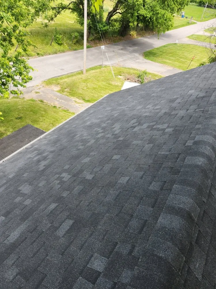 Slide of Holt Roofing