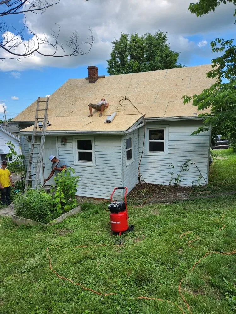 Slide of Holt Roofing