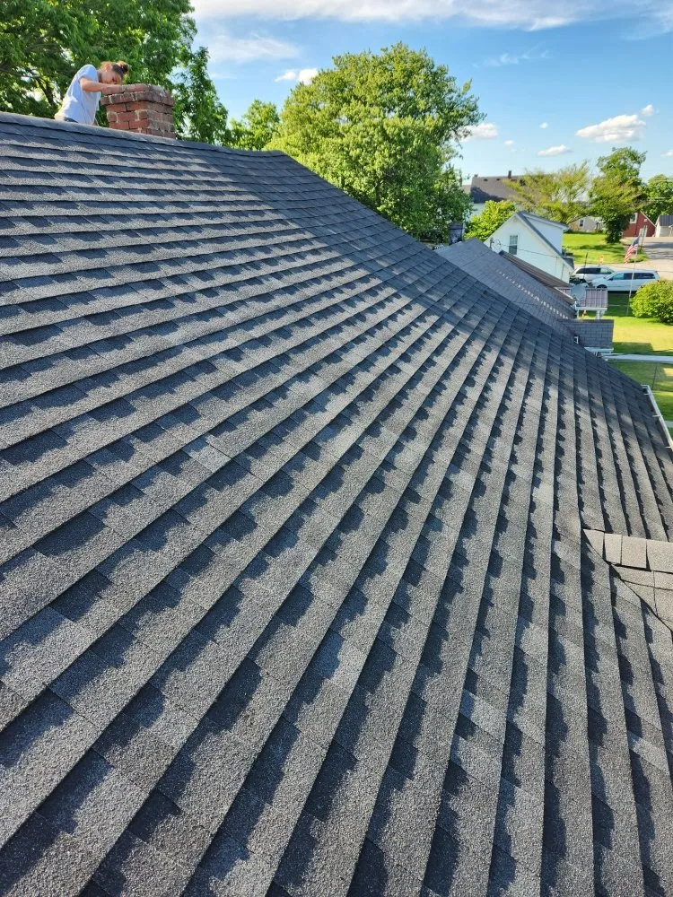 Slide of Holt Roofing