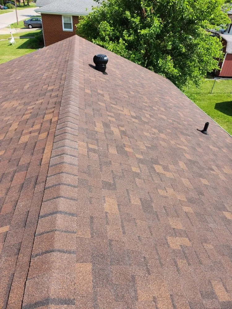 Slide of Holt Roofing