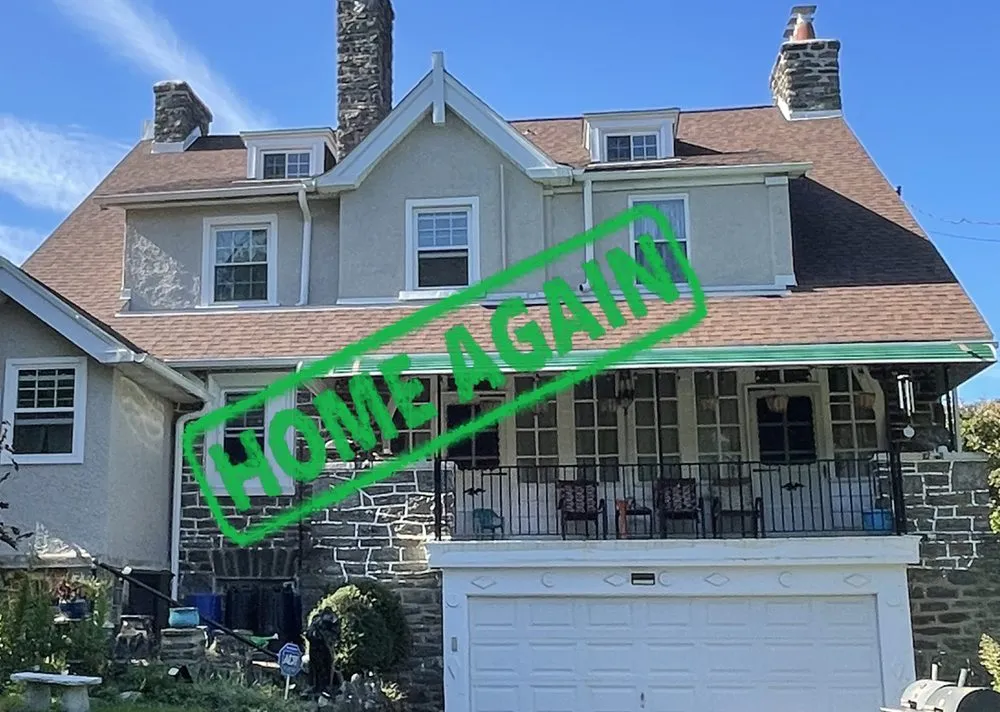 Slide of Home Again Roofing