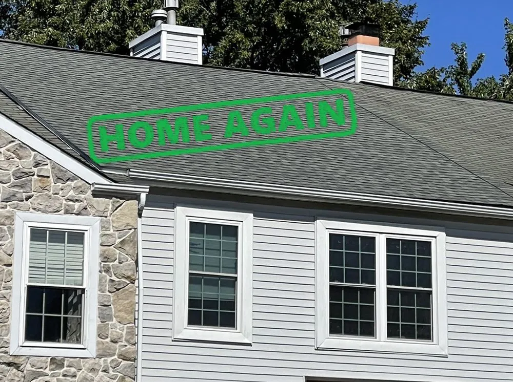 Slide of Home Again Roofing