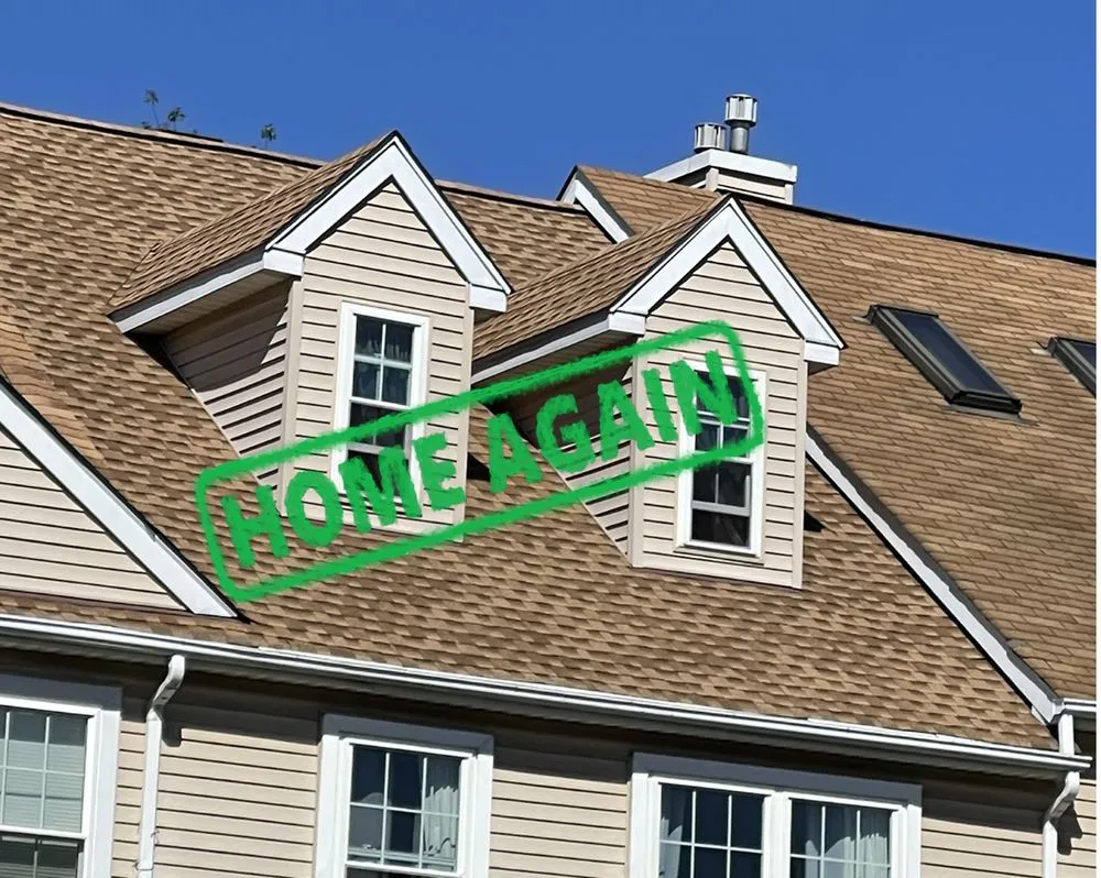 Slide of Home Again Roofing