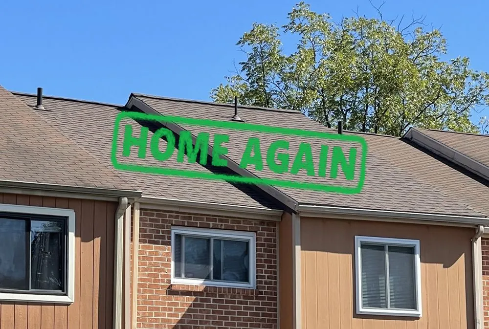 Slide of Home Again Roofing