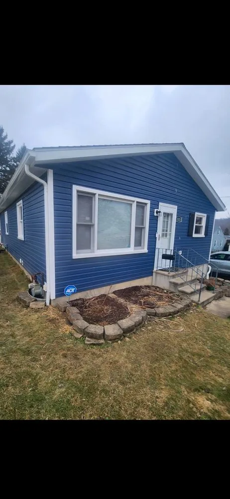 Slide of Home Doctor Exteriors