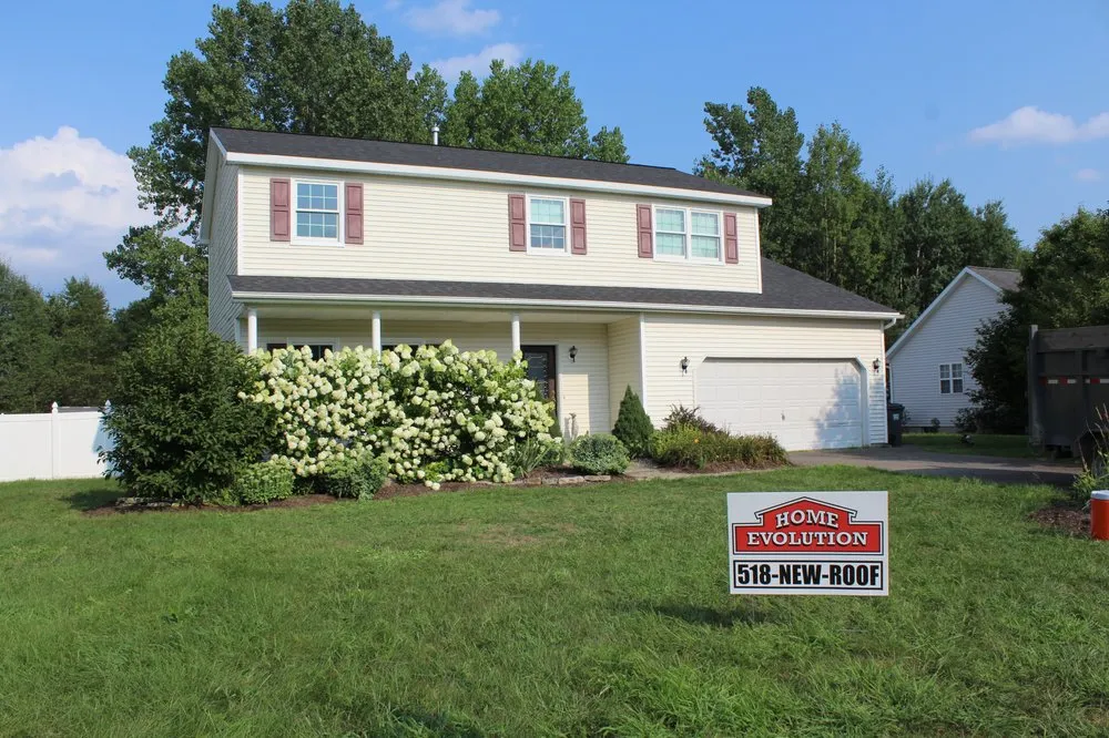 Slide of Home Evolution Roofing