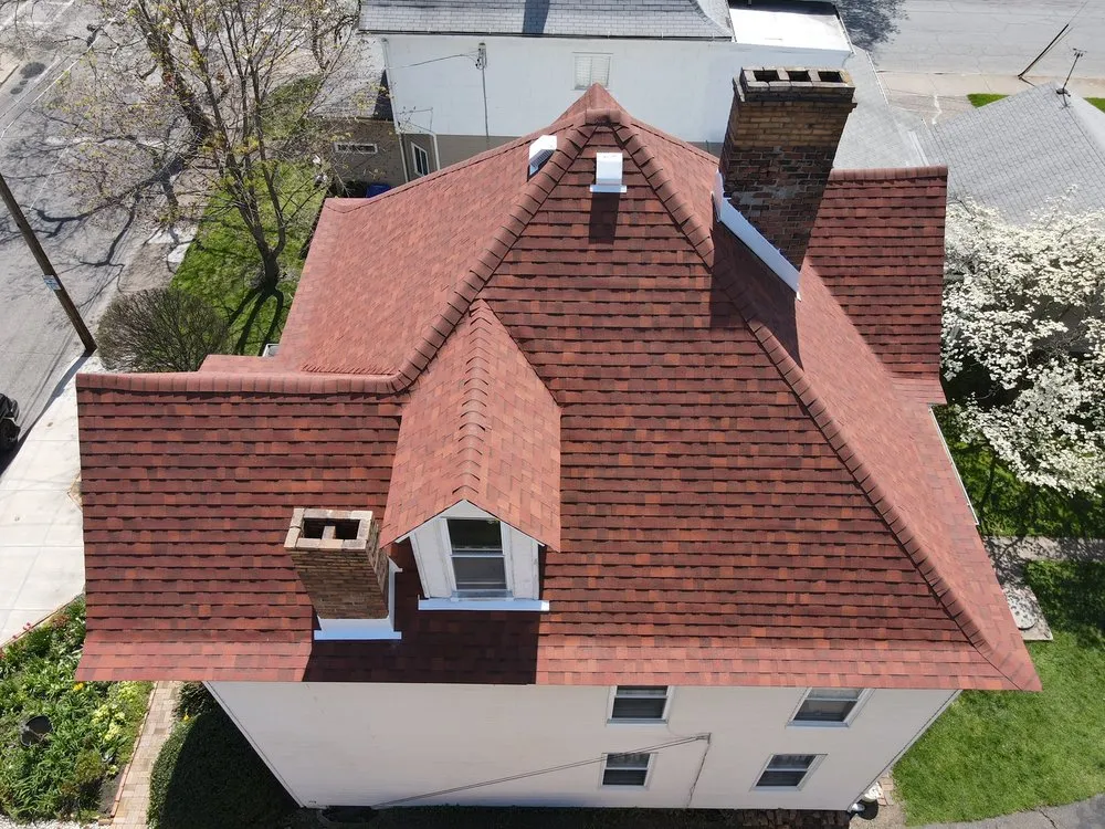 Slide of Home Genius Exteriors