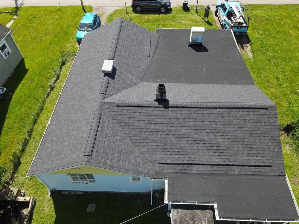 Slide of Home Genius Exteriors