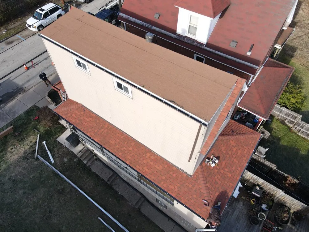 Slide of Home Genius Exteriors