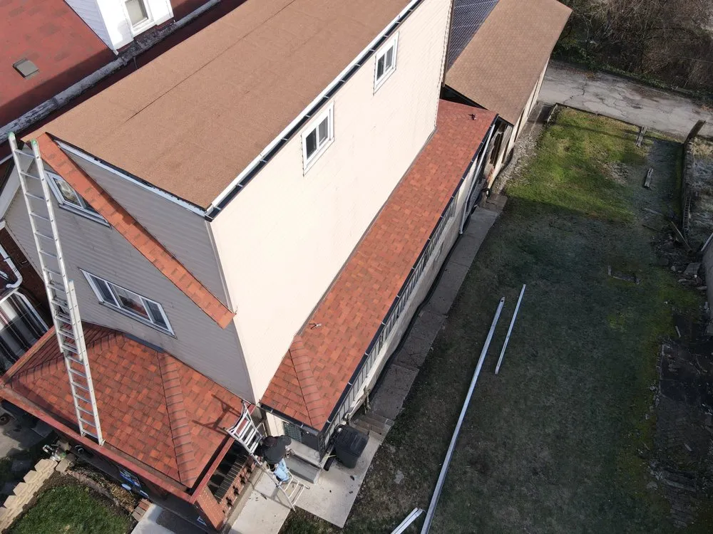 Slide of Home Genius Exteriors