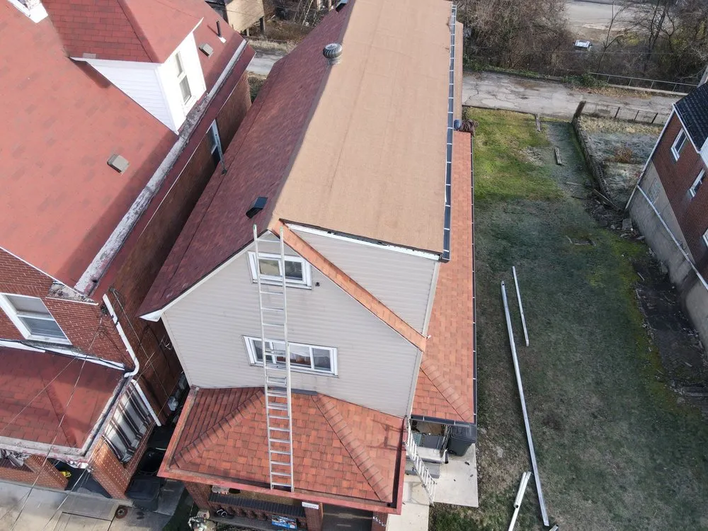 Slide of Home Genius Exteriors