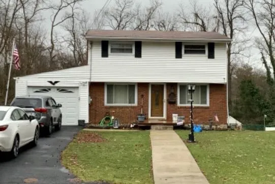 Slide of Home Genius Exteriors