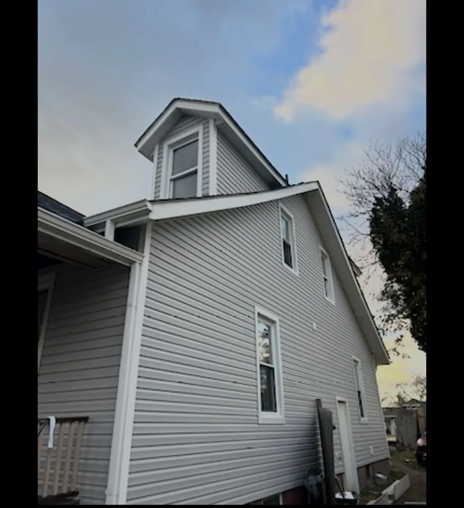 Slide of Home Genius Exteriors