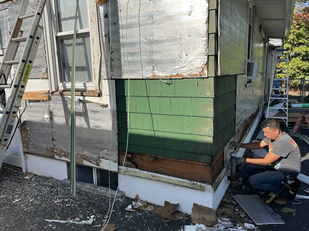 Slide of Home Genius Exteriors