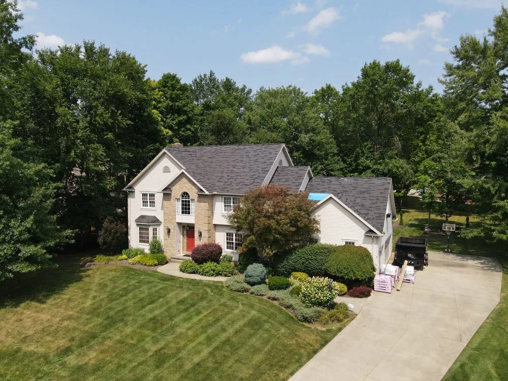 Slide of Home Genius Exteriors