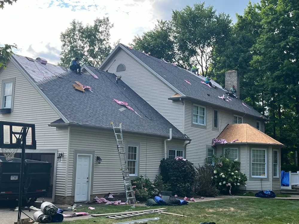 Slide of Home Genius Exteriors