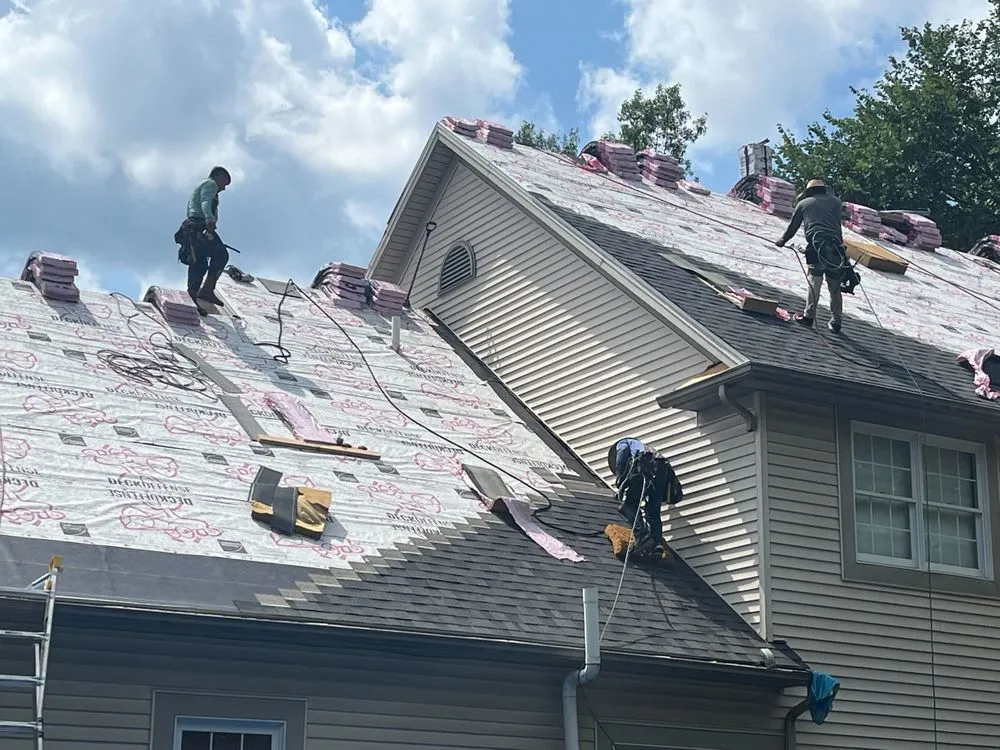 Slide of Home Genius Exteriors