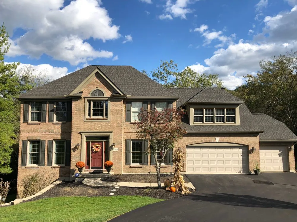 Slide of Home Genius Exteriors