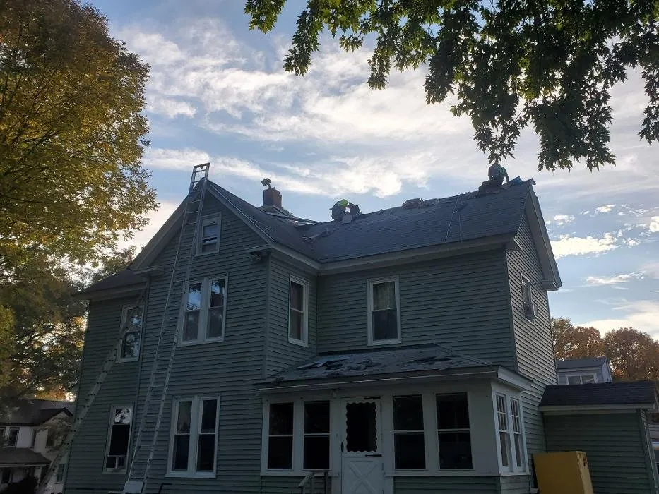 Slide of Home Roofing Solutions