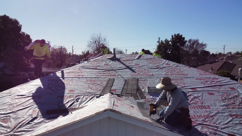 Slide of Home Town Roofing