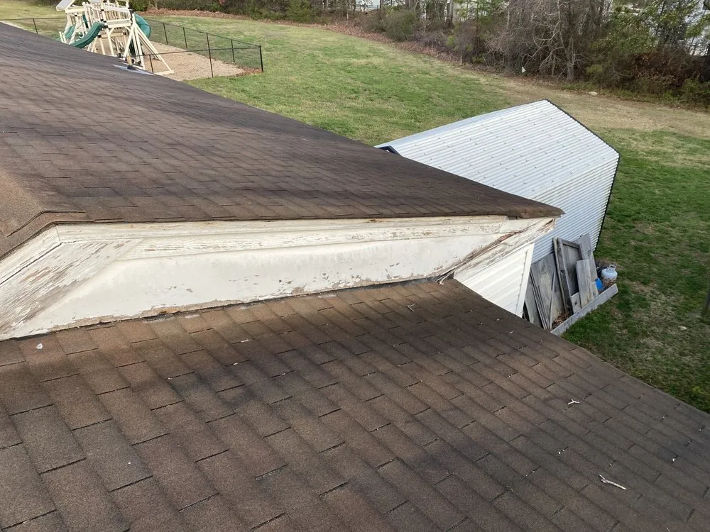 Slide of Home Towne Roofing Systems