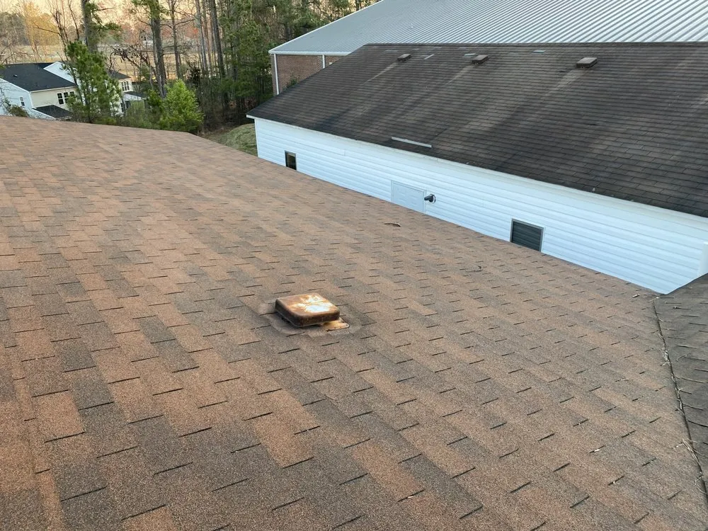 Slide of Home Towne Roofing Systems