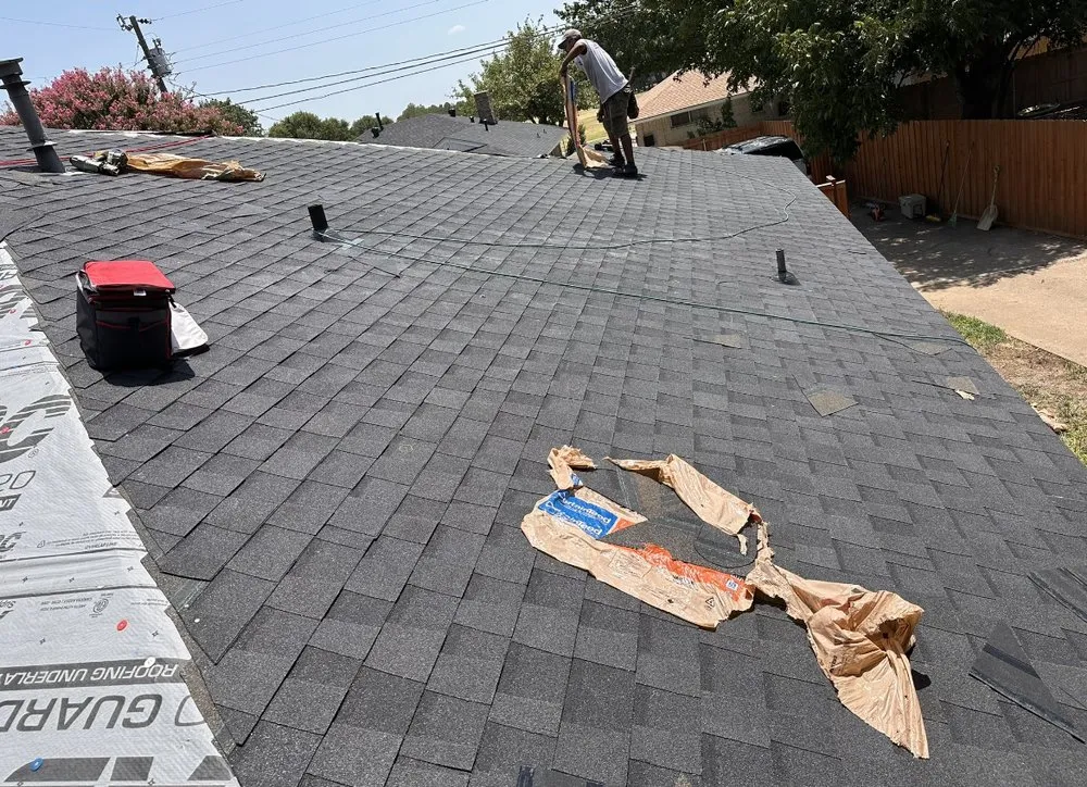 Slide of Homer’s Roofing & Construction