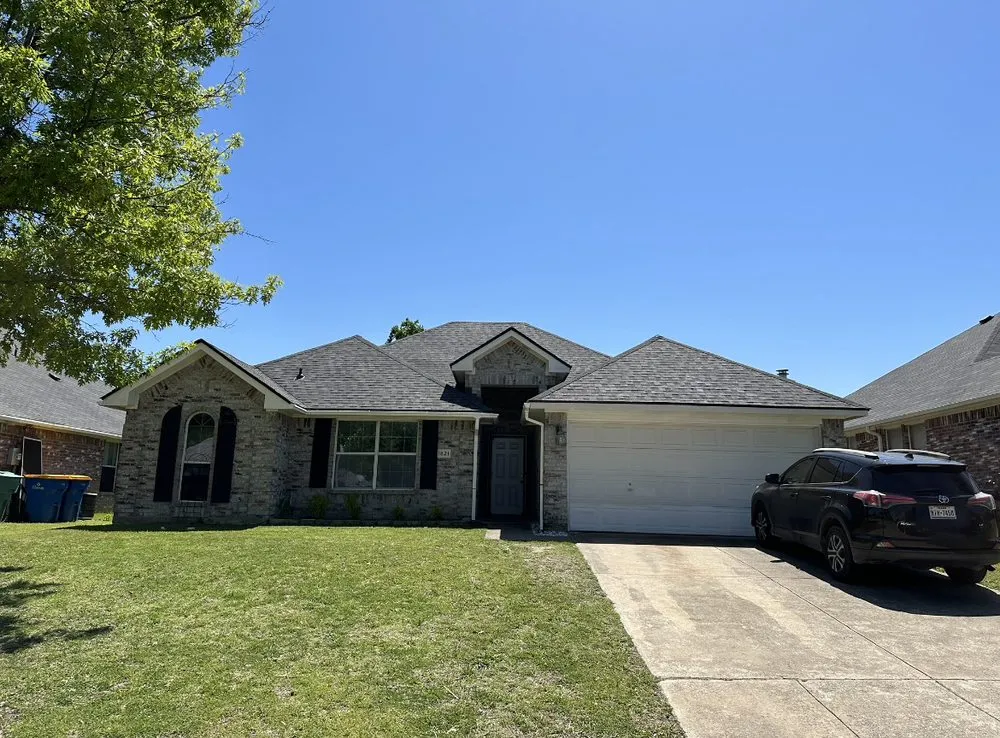Slide of Homer’s Roofing & Construction