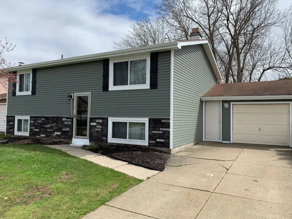 Slide of HomeTeck Roofing & Remodeling