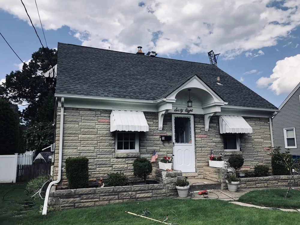 Slide of Hometown Roofing