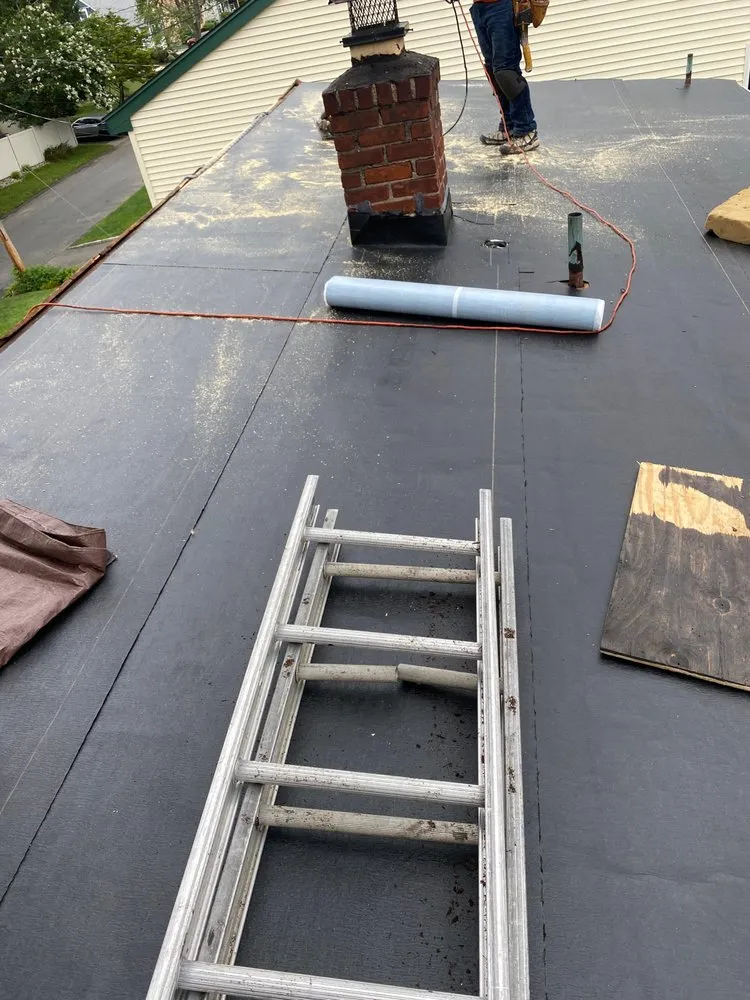 Slide of Hometown Roofing