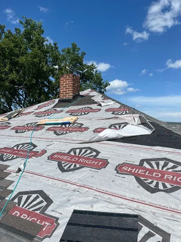 Slide of Hometown Roofing