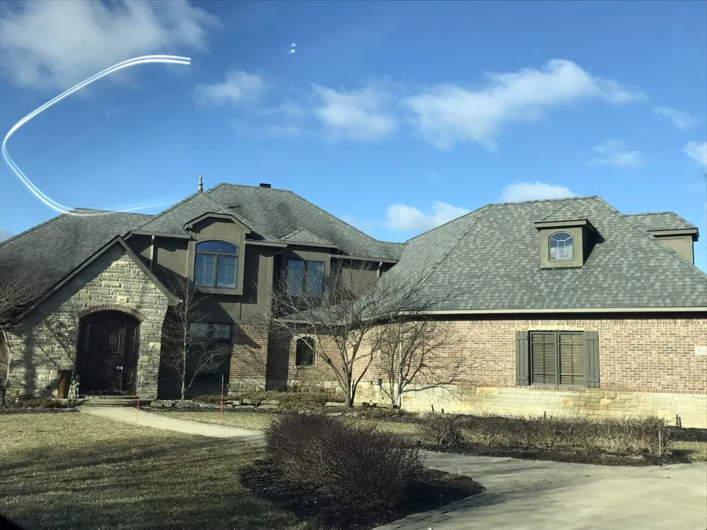 Slide of HomeTown Roofing