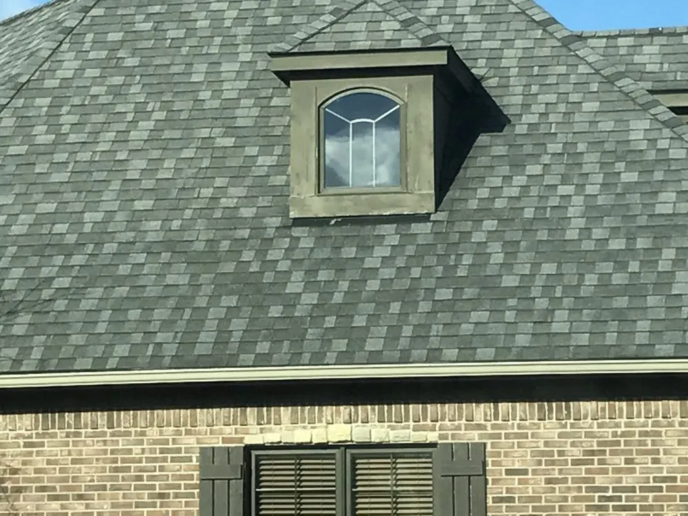 Slide of HomeTown Roofing