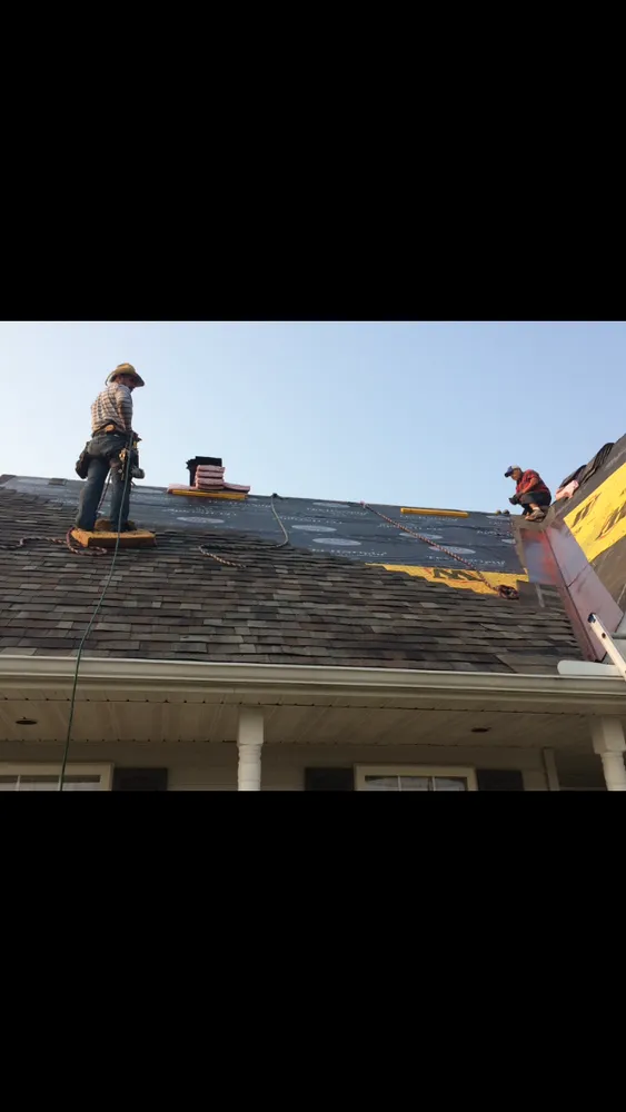 Slide of HomeTown Roofing
