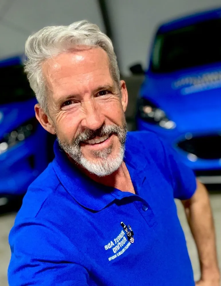 Slide of Honest Abe Roofing