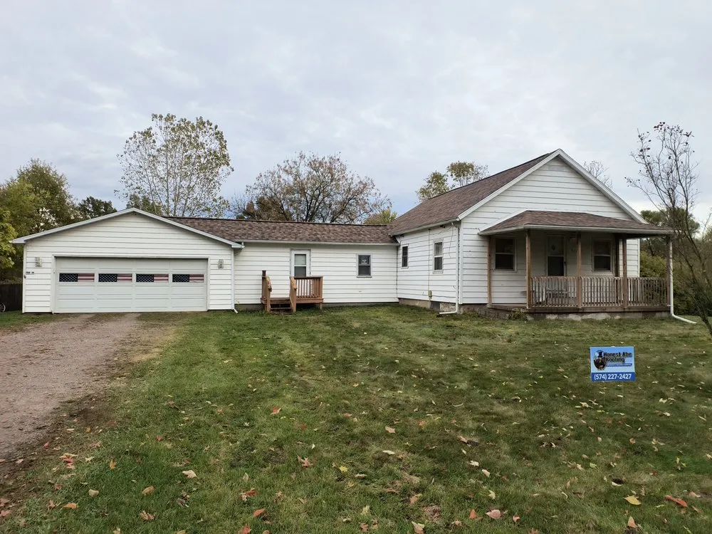 Slide of Honest Abe Roofing