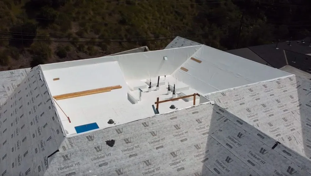 Slide of Honey Badger Roofing