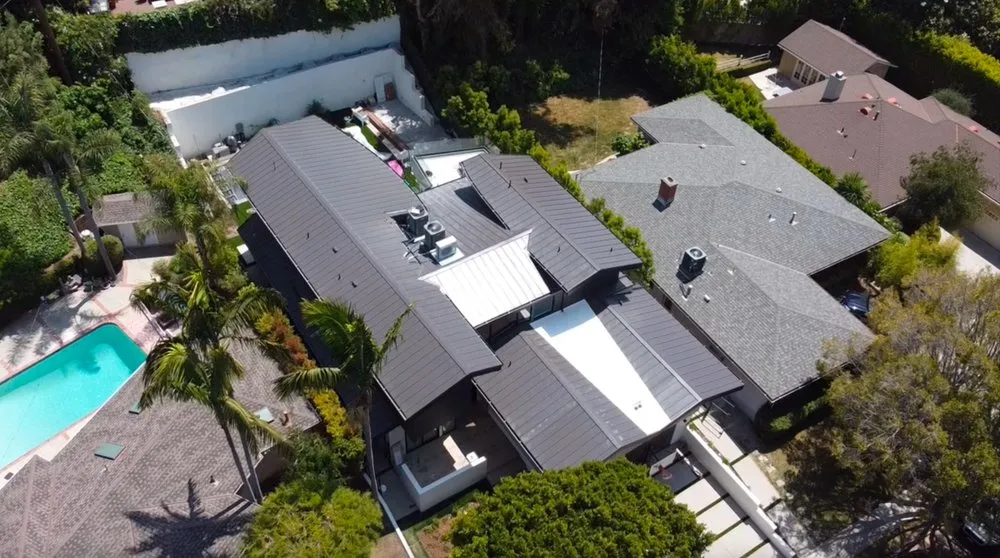 Slide of Honey Badger Roofing