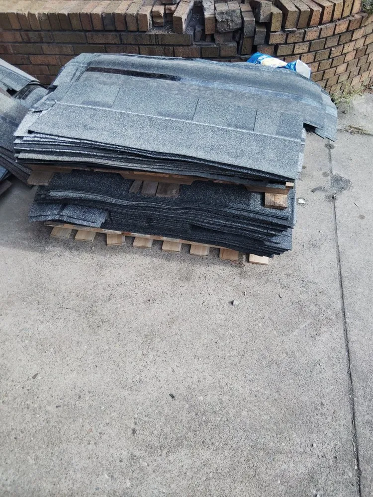 Slide of Hoods Roofing and Services