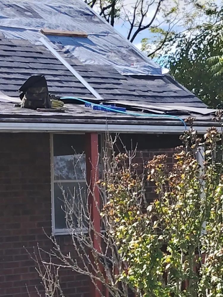 Slide of Hoods Roofing and Services