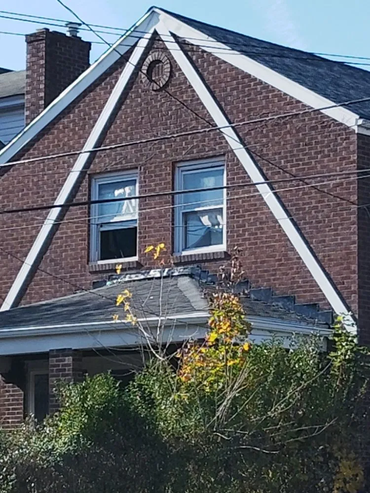 Slide of Hoods Roofing and Services