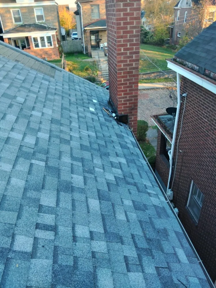 Slide of Hoods Roofing and Services