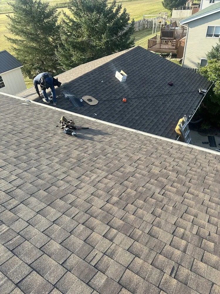 Slide of Hoot Exteriors